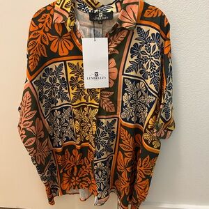 Lexbreezy Hawaii Kaia Blouse
Anuenue Quilt design button down shirt.